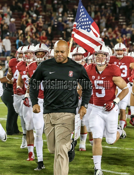 2015StanWash-024.JPG - Oct 24, 2015; Stanford, CA, USA; Stanford Cardinal team takes the field lead by head coach David Shaw and running back Christian McCaffrey (5) for game  against the Washington Huskies at Stanford Stadium. Stanford beat Washington 31-14.
